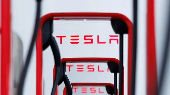 Tesla promises paid robotaxis next year, but significant hurdles remain